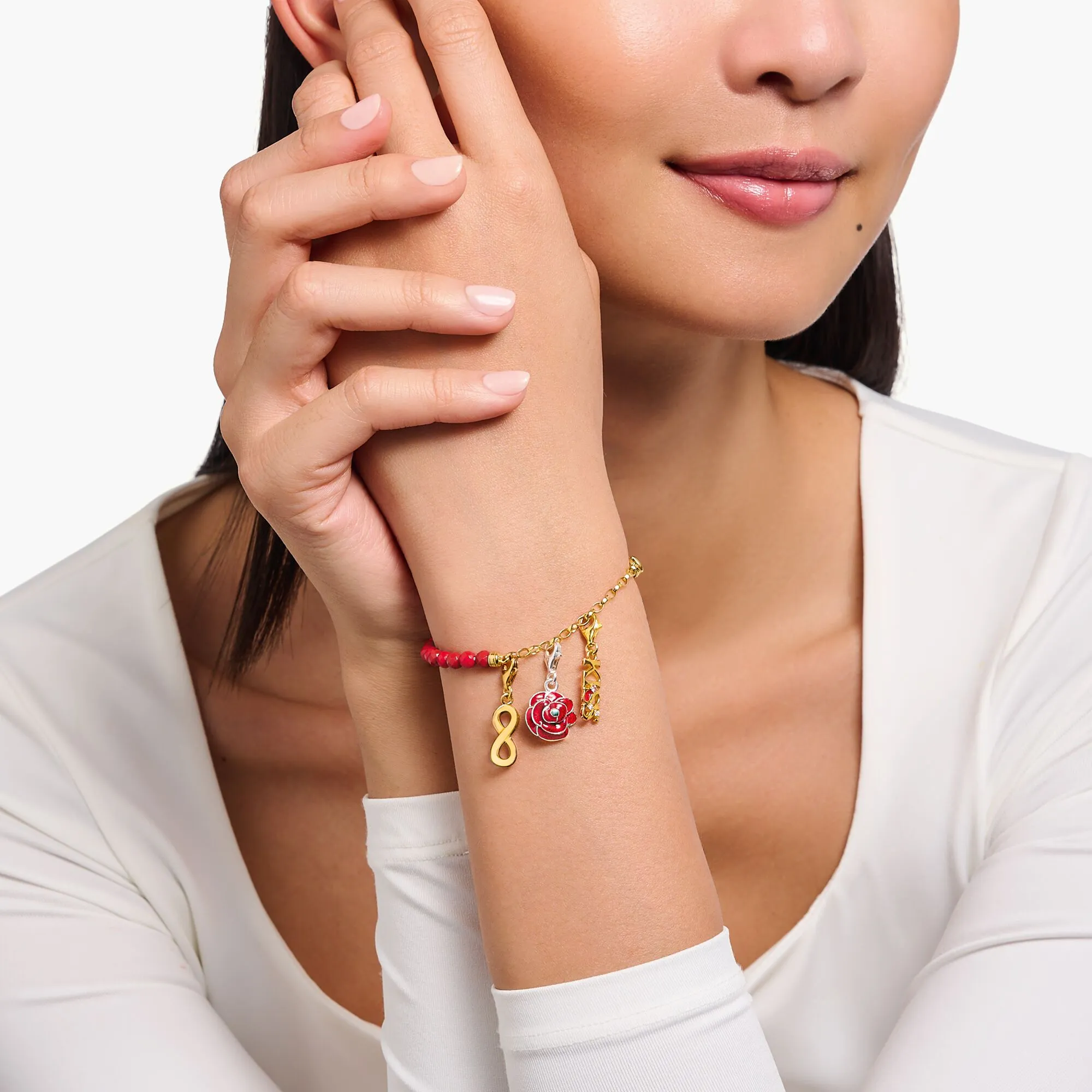 Thomas Sabo Damenarmband Mitglieder Charm-Armband mit roten Perlen